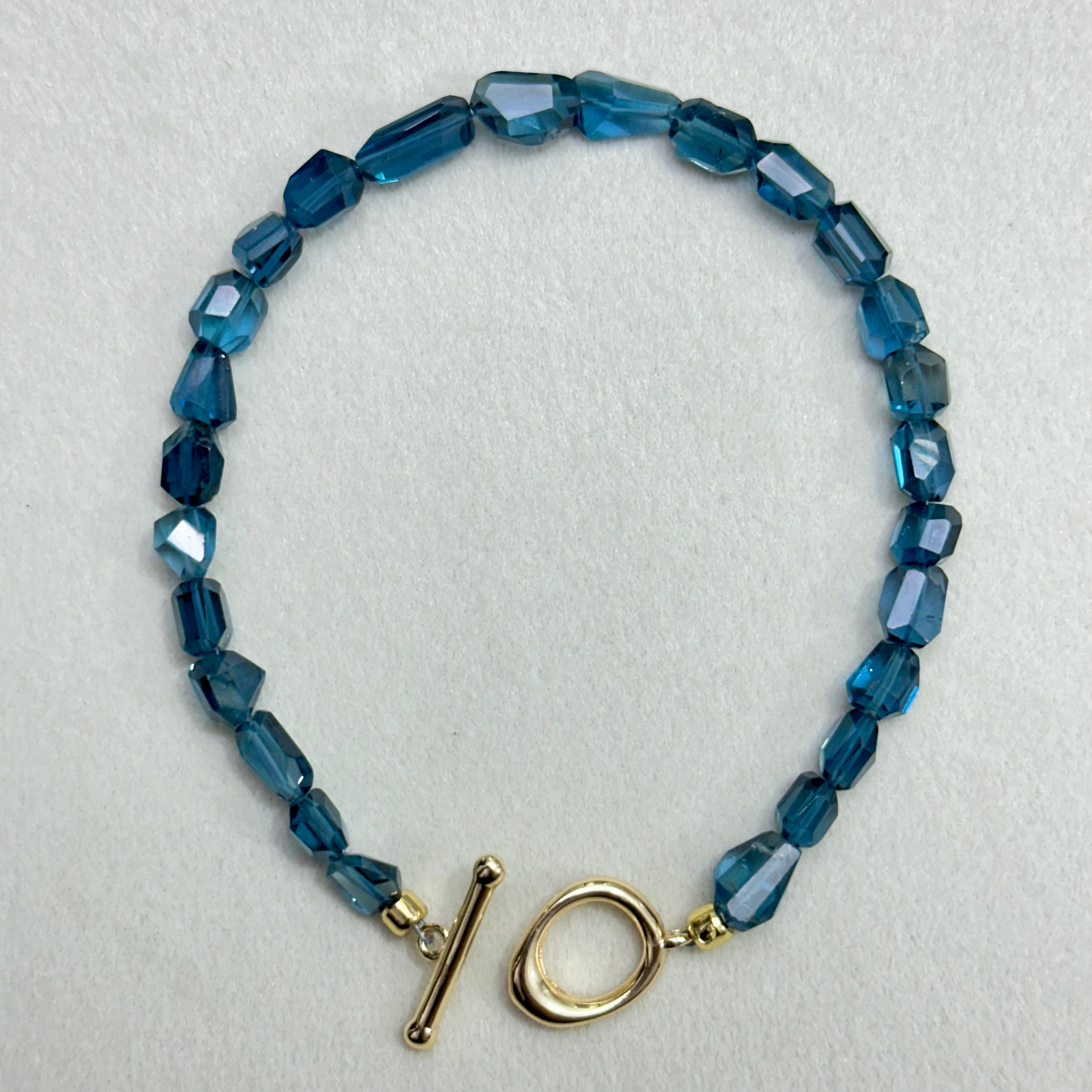 Natural London Blue Topaz Faceted Nugget Bracelet Gold Stainless Steel Toggle Clasp